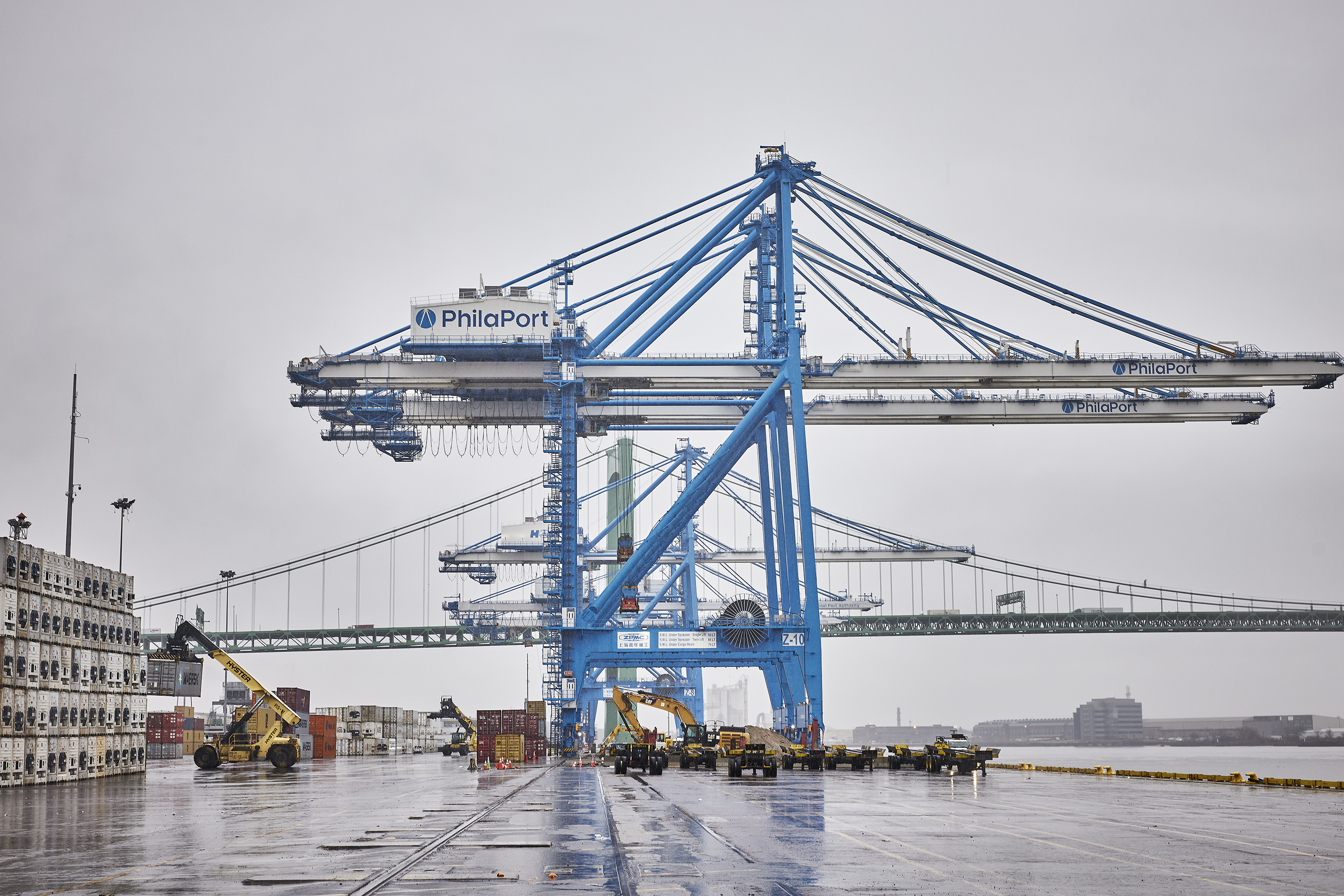 Cargo cranes on a dock at the Port of Philadelphia on a cloudy day