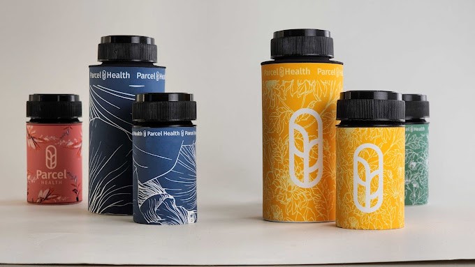 A product photo of coloful pill containers with a modern design on them