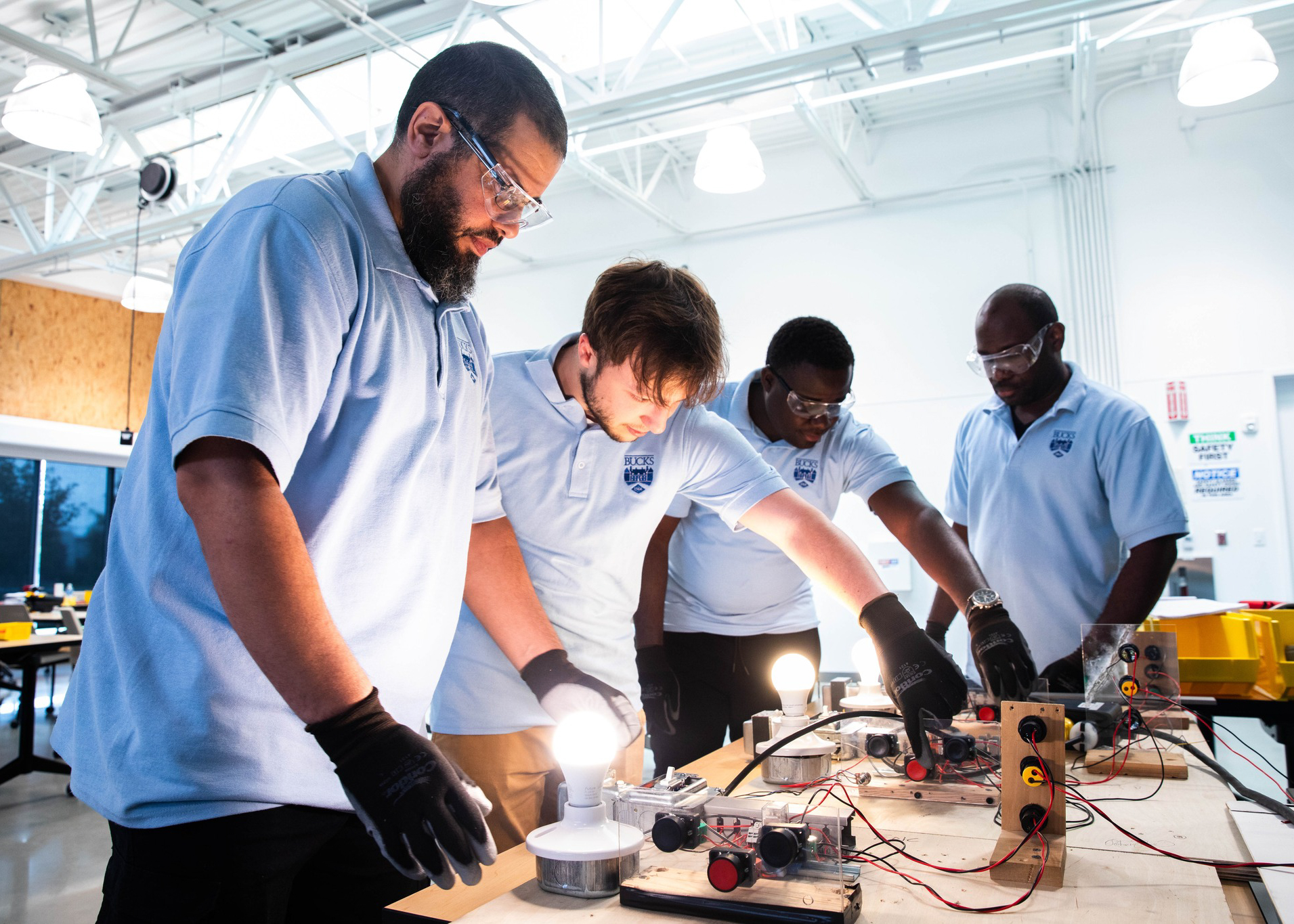 Students collaborate on hands-on electrical project